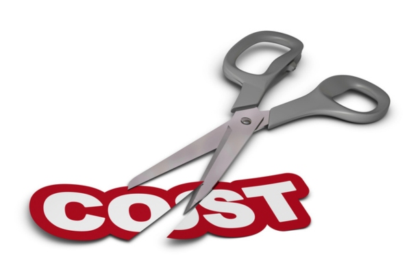 scissors cutting through the word cost depicting low fuel prices in summer