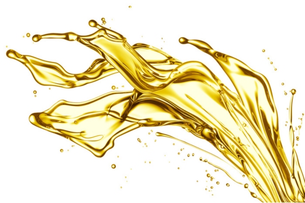 a splash of gold liquid depicting heating oil additives