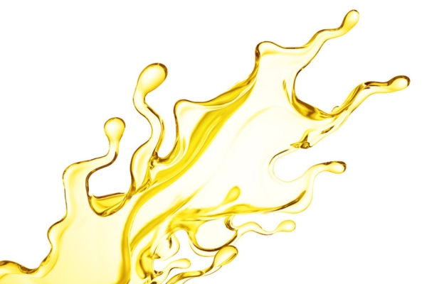 a splash of gold liquid depicting heating oil properties