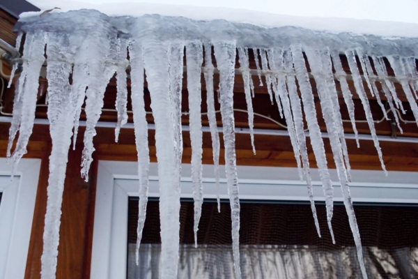 icicles on roof depicting freezing weather