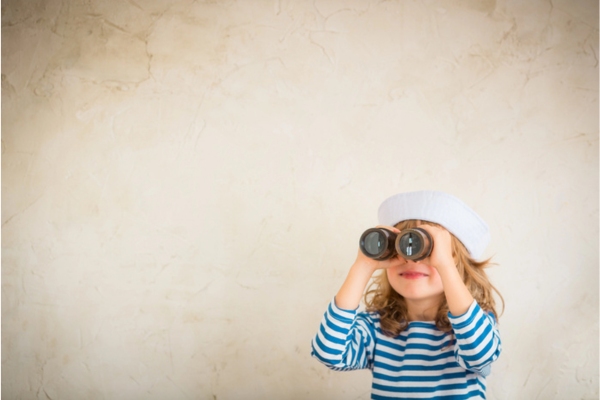 girl looking through the binoculars depicting looking for an HVAC contractor