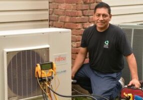 Hart Home Comfort HVAC technician installing ductless air conditioner to a client's house