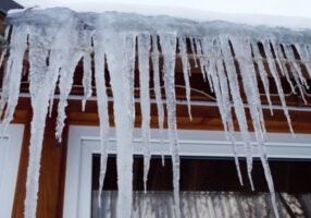 icicles on roof depicting freezing weather